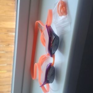 Swans swimming goggles purple and orange